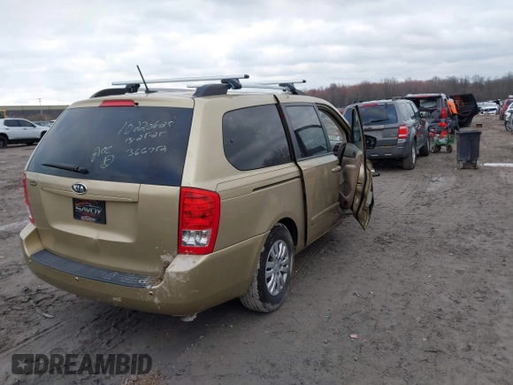 2011 Kia Sedona LX with VIN KNDMG4C74B6366752, listed as a IAAI auction lot 41920267 with 100,616 mi miles. Bid and sale history available at carsss.com. Image 4.