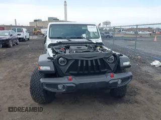 2021 Jeep Wrangler Unlimited Sport S with VIN 1C4HJXDN0MW612698, listed as a IAAI auction lot 41649323 with 22,539 mi miles and . Bid and sale history available at DreamBid. Image 12.