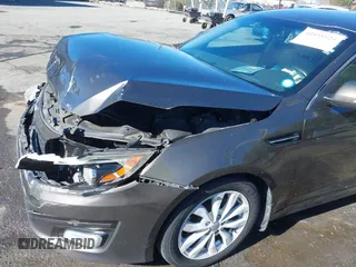2014 Kia Optima EX z VIN 5XXGN4A78EG320367, wystawiony jako IAAI lot #41858824 z przebiegiem 216 987 mil mil oraz . Historia ofert i sprzedaży dostępna na DreamBid. Obrazek 18.