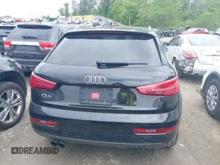 2016 Audi Q3 Premium Plus with VIN WA1BFCFSXGR022587, listed as a IAAI auction lot 42133288 with 141,609 mi miles. Bid and sale history available at carsss.com. Image 16.