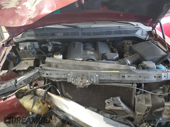 2004 Nissan Titan SE z VIN 1N6AA06A84N590696, wystawiony jako Copart lot #55947145 z przebiegiem 244 851 mil mil oraz Szkoda całkowita • Salvage title. Historia ofert i sprzedaży dostępna na DreamBid. Obrazek 11.