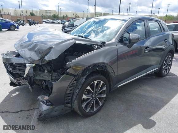 2019 Mazda CX-3 Grand Touring with VIN JM1DKDD71K1445905, listed as a IAAI auction lot 41674243 with 64,949 mi miles. Bid and sale history available at carsss.com. Image 2.