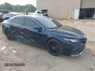 2021 Toyota Camry XSE z VIN 4T1K61AK4MU485430, wystawiony jako IAAI lot #42094588 z przebiegiem 103 556 mil mil oraz . Historia ofert i sprzedaży dostępna na DreamBid. Obrazek 1.
