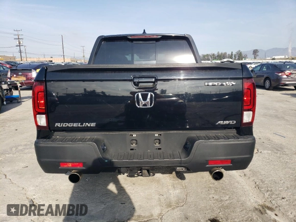 2023 Honda Ridgeline RTL with VIN 5FPYK3F52PB023574, listed as a Copart auction lot 44419565 with 15,205 mi miles and Salvage title. Bid and sale history available at DreamBid. Image 6.