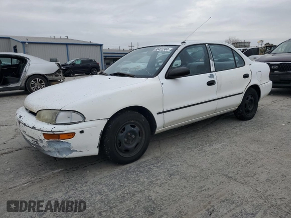 1997 Geo Prizm z VIN 1Y1SK526XVZ437486, wystawiony jako Copart lot #86422384 z przebiegiem 404 485 mil mil oraz Tytuł czysty. Historia ofert i sprzedaży dostępna na DreamBid. Obrazek 1.