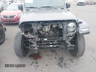 2021 Jeep Wrangler Unlimited Sahara z VIN 1C4JJXP68MW745098, wystawiony jako IAAI lot #41461092 z przebiegiem 36 410 mil mil oraz . Historia ofert i sprzedaży dostępna na DreamBid. Obrazek 6.