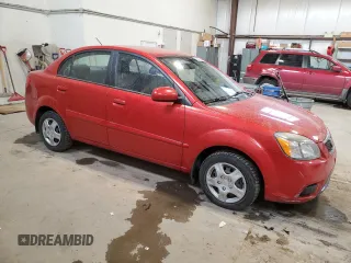 2010 Kia Rio with VIN KNADH4B39A6691792, listed as a Copart auction lot 80043064 with 161,139 mi miles and Salvage Title. Bid and sale history available at DreamBid. Image 4.