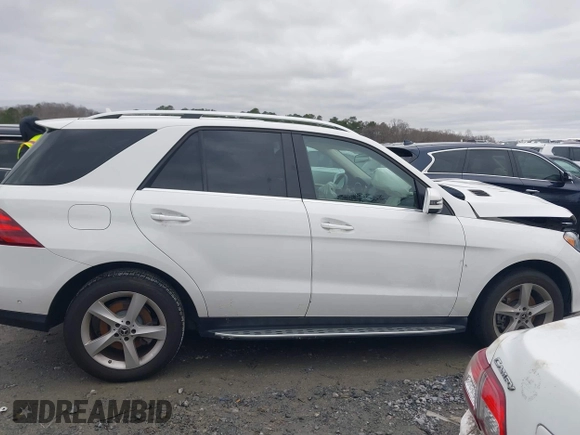2019 Mercedes-Benz GLE 400 with VIN 4JGDA5GB0KB210149, listed as a IAAI auction lot 41252945 with 72,724 mi miles and . Bid and sale history available at DreamBid. Image 13.