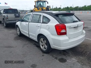 2011 Dodge Caliber Mainstreet with VIN 1B3CB3HA0BD157191, listed as a IAAI auction lot 42128580 with 185,474 mi miles. Bid and sale history available at carsss.com. Image 3.