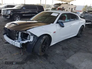 2023 Dodge Charger Scat Pack Widebody with VIN 2C3CDXGJ6PH635498, listed as a IAAI auction lot 41448100 with 13,678 mi miles and . Bid and sale history available at DreamBid. Image 2.