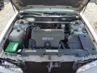 1997 Pontiac Bonneville SE z VIN 1G2HX52K7VH211607, wystawiony jako Copart lot #73705454 z przebiegiem 116 307 mil mil oraz Szkoda całkowita • Salvage title. Historia ofert i sprzedaży dostępna na DreamBid. Obrazek 11.