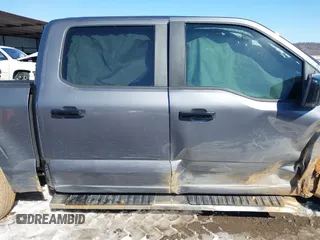 2021 Ford F-150 XL z VIN 1FTEW1C51MFC94173, wystawiony jako IAAI lot #41628222 z przebiegiem 23 266 mil mil oraz . Historia ofert i sprzedaży dostępna na DreamBid. Obrazek 14.