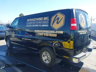 2016 Chevrolet Express Cargo Van with VIN 1GCWGAFF0G1154459, listed as a IAAI auction lot 41647930 with 100,142 mi miles. Bid and sale history available at carsss.com. Image 3.