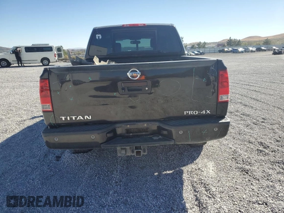 2014 Nissan Titan S with VIN 1N6AA0EC1EN510658, listed as a Copart auction lot 75210054 with Not Provided miles and Salvage Title. Bid and sale history available at DreamBid. Image 6.