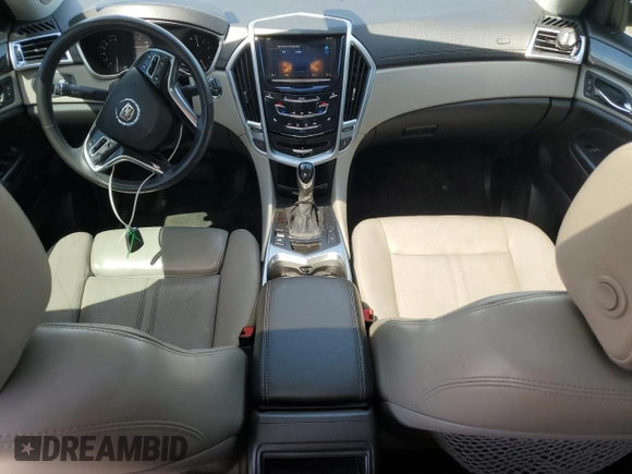 2016 Cadillac SRX Luxury Collection z VIN 3GYFNBE34GS505188, wystawiony jako Copart lot #56690805 z przebiegiem 121 935 mil mil oraz Czysty tytuł • Clean title. Historia ofert i sprzedaży dostępna na DreamBid. Obrazek 8.
