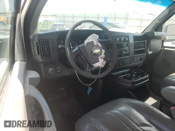 2011 Chevrolet Express Cargo with VIN 1GCWGGCA1B1130496, listed as a Copart auction lot 55515135 with 212,589 mi miles and Salvage title. Bid and sale history available at DreamBid. Image 8.