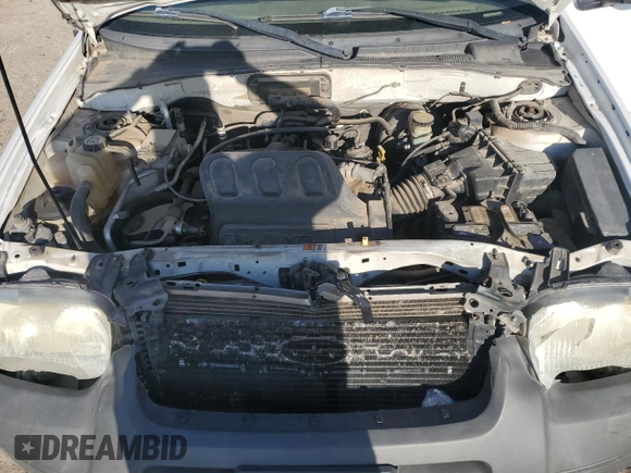 2004 Ford Escape XLT with VIN 1FMYU93104KA32047, listed as a Copart auction lot 61364985 with 160,822 mi miles and Salvage title. Bid and sale history available at DreamBid. Image 12.
