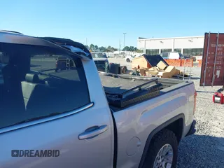 2017 GMC Sierra 1500 SLE with VIN 3GTU2MEC3HG199980, listed as a IAAI auction lot 40534708 with 129,765 mi miles and . Bid and sale history available at DreamBid. Image 6.
