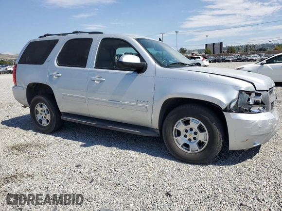 2014 Chevrolet Tahoe LT with VIN 1GNSCBE09ER118630, listed as a Copart auction lot 58906965 with 92,734 mi miles and Salvage title. Bid and sale history available at DreamBid. Image 4.