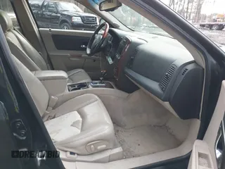 2004 Cadillac SRX with VIN 1GYEE63A440162356, listed as a IAAI auction lot 41380359 with 228,656 mi miles. Bid and sale history available at carsss.com. Image 5.