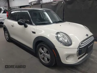 2014 MINI Hardtop with VIN WMWXM5C59ET933485, listed as a IAAI auction lot 42294265 with 94,821 mi miles and . Bid and sale history available at DreamBid. Image 1.