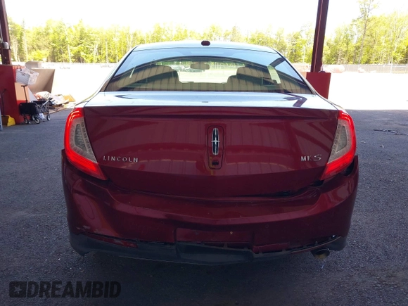 2014 Lincoln MKS z VIN 1LNHL9DK0EG606497, wystawiony jako IAAI lot #42279603 z przebiegiem 129 972 mil mil oraz . Historia ofert i sprzedaży dostępna na DreamBid. Obrazek 16.