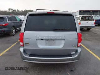 2017 Dodge Grand Caravan SXT with VIN 2C4RDGCG9HR677157, listed as a IAAI auction lot 41470342 with 66,611 mi miles and . Bid and sale history available at DreamBid. Image 16.