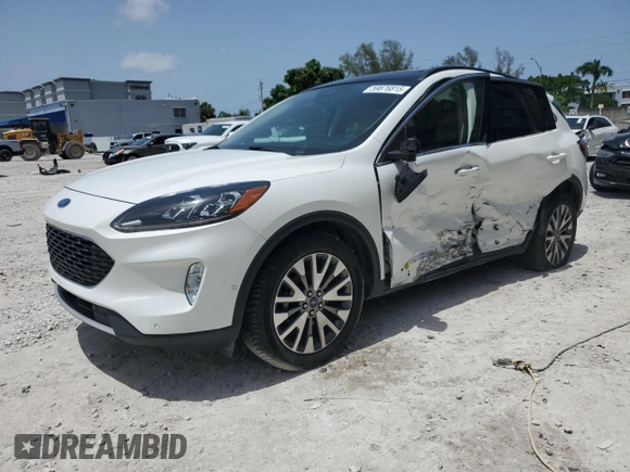 2020 Ford Escape Titanium Hybrid with VIN 1FMCU9DZ0LUB95931, listed as a Copart auction lot 59876815 with 67,932 mi miles and Salvage title. Bid and sale history available at DreamBid. Image 1.