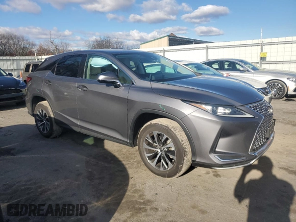 2021 Lexus RX with VIN 2T2AZMDA7MC275120, listed as a Copart auction lot 80251094 with 8,595 mi miles and Salvage Title. Bid and sale history available at carsss.com. Image 4.