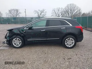 2018 Cadillac XT5 FWD with VIN 1GYKNARS6JZ160993, listed as a IAAI auction lot 41472847 with 113,415 mi miles. Bid and sale history available at carsss.com. Image 14.