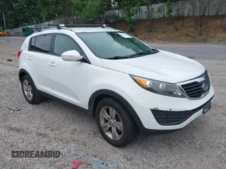 2012 Kia Sportage LX with VIN KNDPB3A21C7266102, listed as a IAAI auction lot 42685016 with 173,425 mi miles and . Bid and sale history available at DreamBid. Image 1.