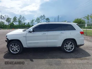 2014 Jeep Grand Cherokee Summit with VIN 1C4RJFJT6EC281114, listed as a IAAI auction lot 42497582 with 128,181 mi miles and . Bid and sale history available at DreamBid. Image 14.