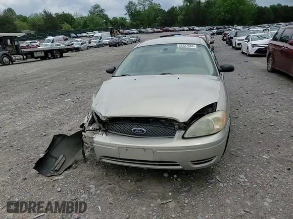 2006 Ford Taurus SE z VIN 1FAFP53U56A151555, wystawiony jako Copart lot #55227665 z przebiegiem 146 109 mil mil oraz Szkoda całkowita • Salvage title. Historia ofert i sprzedaży dostępna na DreamBid. Obrazek 13.