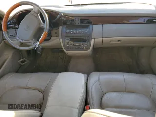 2001 Cadillac DeVille DHS z VIN 1G6KE57Y31U229255, wystawiony jako Copart lot #75101214 z przebiegiem 141 187 mil mil oraz Czysty tytuł • Clean title. Historia ofert i sprzedaży dostępna na DreamBid. Obrazek 8.
