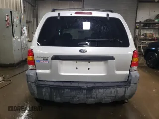 2005 Ford Escape XLT z VIN 1FMYU93145KA20050, wystawiony jako Copart lot #76794024 z przebiegiem 98 559 mil mil oraz Szkoda całkowita • Salvage title. Historia ofert i sprzedaży dostępna na DreamBid. Obrazek 6.