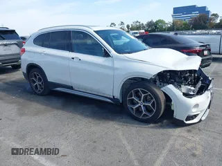 2018 BMW X1 xDrive28i with VIN WBXHT3C37J5K28375, listed as a IAAI auction lot 42039336 with 28,664 mi miles. Bid and sale history available at carsss.com. Image 13.