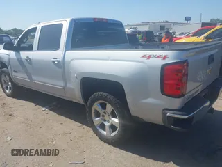 2015 Chevrolet Silverado 1500 LT with VIN 3GCUKREC7FG343346, listed as a IAAI auction lot 41972214 with 256,067 mi miles and . Bid and sale history available at DreamBid. Image 3.