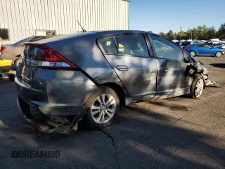2012 Honda Insight EX z VIN JHMZE2H72CS006248, wystawiony jako Copart lot #73184844 z przebiegiem Nie podano mil oraz Szkoda całkowita • Salvage title. Historia ofert i sprzedaży dostępna na DreamBid. Obrazek 3.
