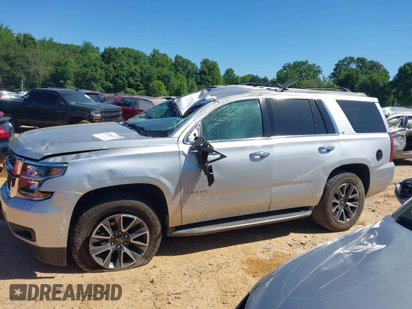 2020 Chevrolet Tahoe LT with VIN 1GNSKBKC5LR121085, listed as a IAAI auction lot 42341677 with 123,579 mi miles and . Bid and sale history available at DreamBid. Image 14.