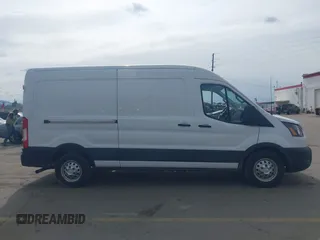 2020 Ford Transit Cargo with VIN 1FTBR2CG1LKB43034, listed as a IAAI auction lot 41668193 with 56,827 mi miles and . Bid and sale history available at DreamBid. Image 13.