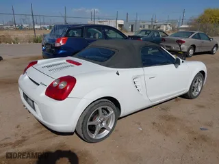 2003 Toyota MR2 Spyder with VIN JTDFR320730054365, listed as a IAAI auction lot 41929249 with 97,419 mi miles. Bid and sale history available at carsss.com. Image 4.