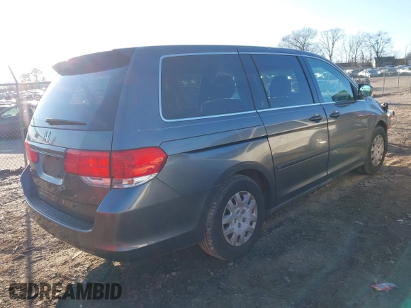 2010 Honda Odyssey LX with VIN 5FNRL3H28AB026712, listed as a IAAI auction lot 41281625 with 223,905 mi miles. Bid and sale history available at carsss.com. Image 4.