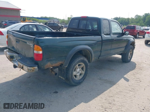 2002 Toyota Tacoma with VIN 5TEWM72NX2Z097369, listed as a IAAI auction lot 42476892 with 90,855 mi miles and . Bid and sale history available at DreamBid. Image 4.