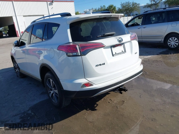 2018 Toyota RAV4 XLE with VIN JTMWFREV8JJ157496, listed as a IAAI auction lot 41816017 with 64,767 mi miles. Bid and sale history available at carsss.com. Image 3.