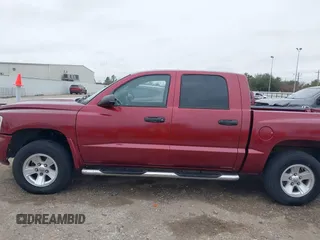 2006 Dodge Dakota SLT with VIN 1D7HE48KX6S598831, listed as a IAAI auction lot 41292884 with 173,181 mi miles and . Bid and sale history available at carsss.com. Image 14.