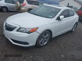 2014 Acura ILX Technology with VIN 19VDE1F75EE012228, listed as a IAAI auction lot 41958455 with 102,085 mi miles and . Bid and sale history available at DreamBid. Image 2.