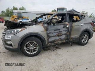 2017 Hyundai Santa Fe 2.4L z VIN 5NMZUDLB0HH042101, wystawiony jako Copart lot #55058145 z przebiegiem Nie podano mil oraz Szkoda całkowita • Salvage title. Historia ofert i sprzedaży dostępna na DreamBid. Obrazek 1.
