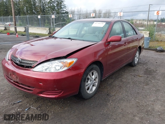 2004 Toyota Camry LE with VIN 4T1BF32K74U069737, listed as a IAAI auction lot 41746236 with 48,026 mi miles. Bid and sale history available at carsss.com. Image 2.