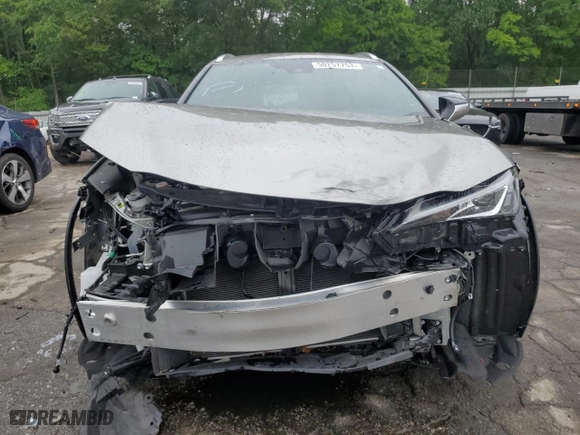 2021 Lexus UX with VIN JTHX9JBH9M2042298, listed as a Copart auction lot 50257753 with 38,328 mi miles. Bid and sale history available at carsss.com. Image 5.