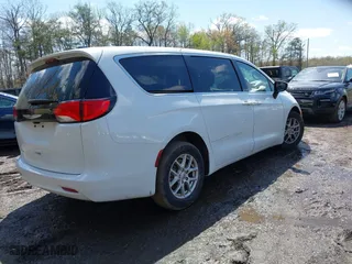 2023 Chrysler Voyager LX with VIN 2C4RC1CG4PR534115, listed as a IAAI auction lot 41979160 with 54,199 mi miles. Bid and sale history available at carsss.com. Image 4.